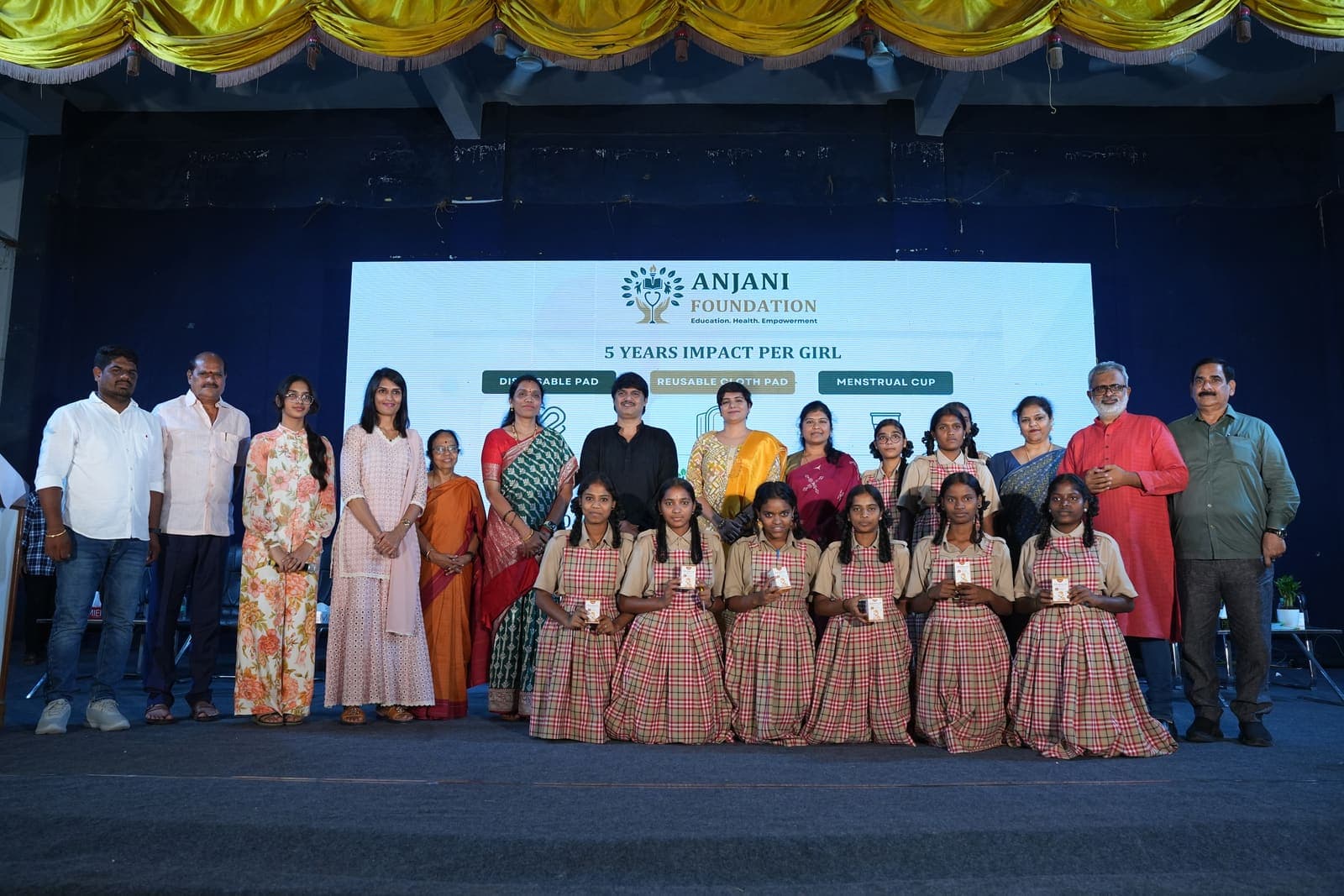Teachers and students on stage